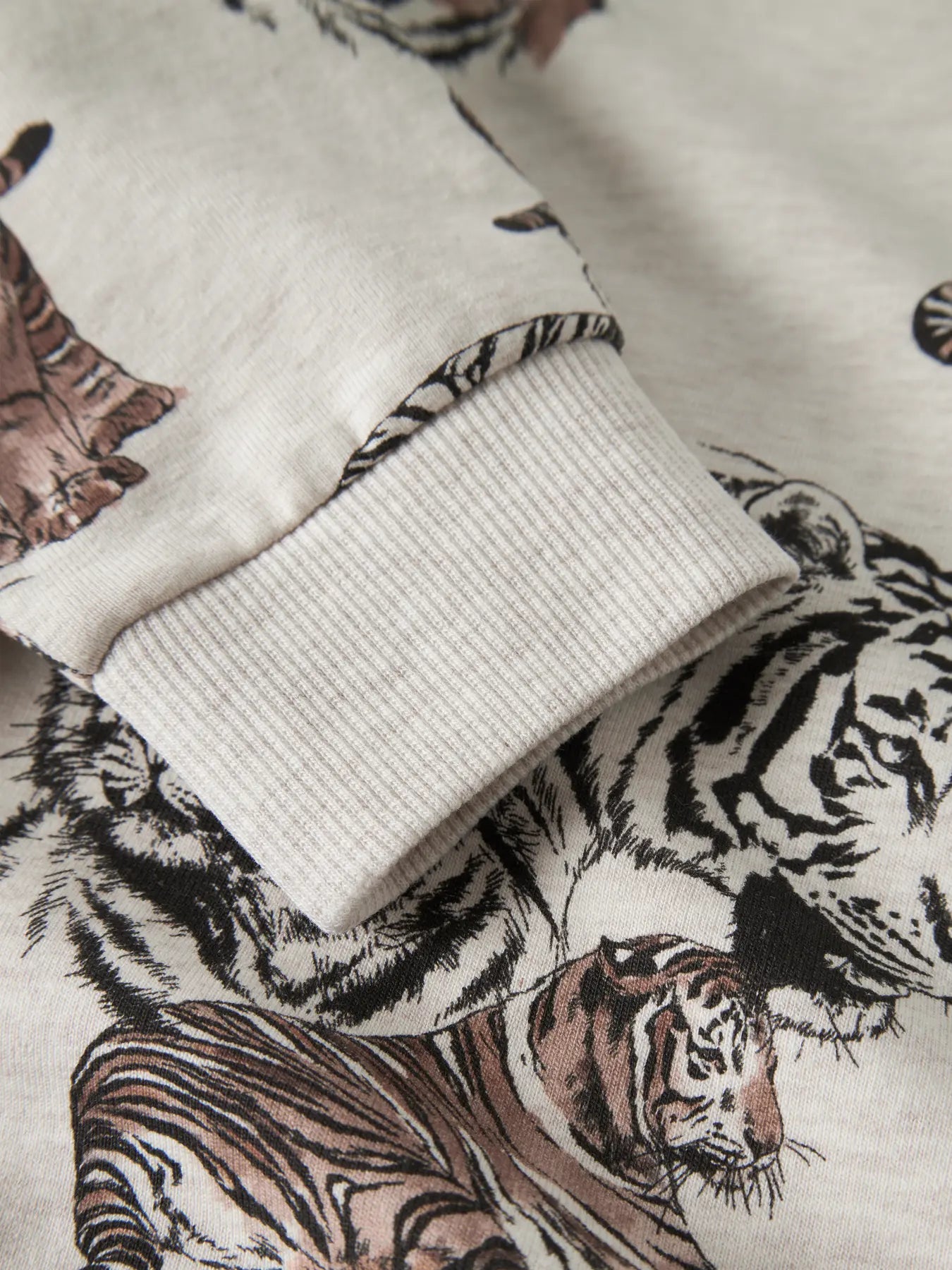 Name it: sweater tijger peyote melange