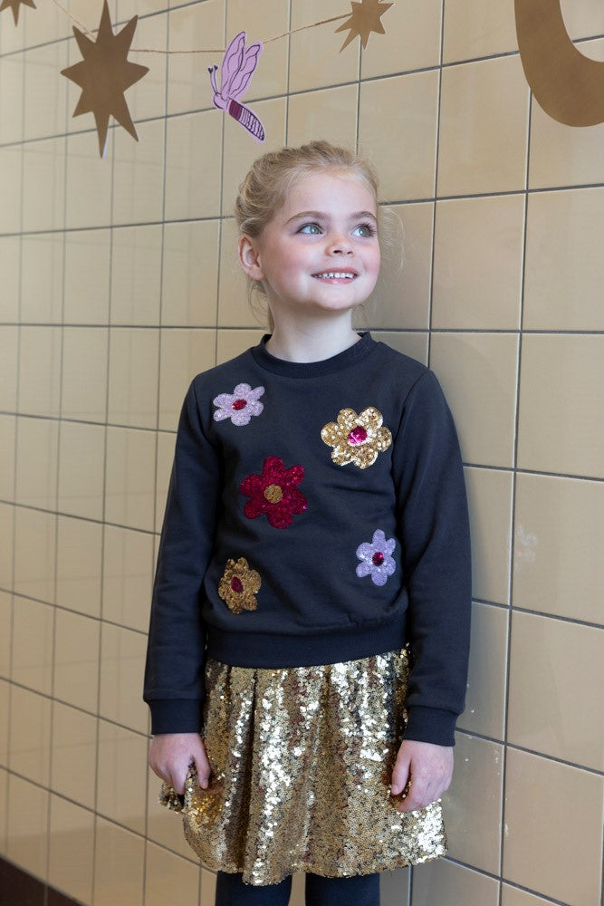 Jubel: Shine bright: sweater bloemen pailleten