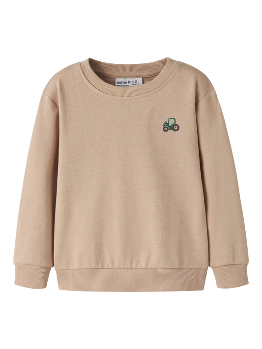 Name it: sweater tractor sand