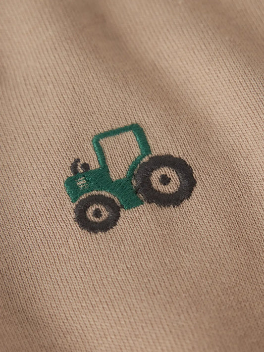 Name it: sweater tractor sand
